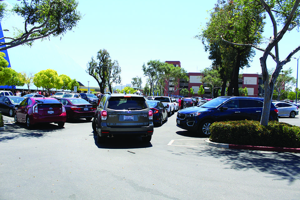 Parking at CSULB can be just as bad as parking throughout the city of Long Beach. The parking is packed on a Sunday afternoon for graduation ceremonies.