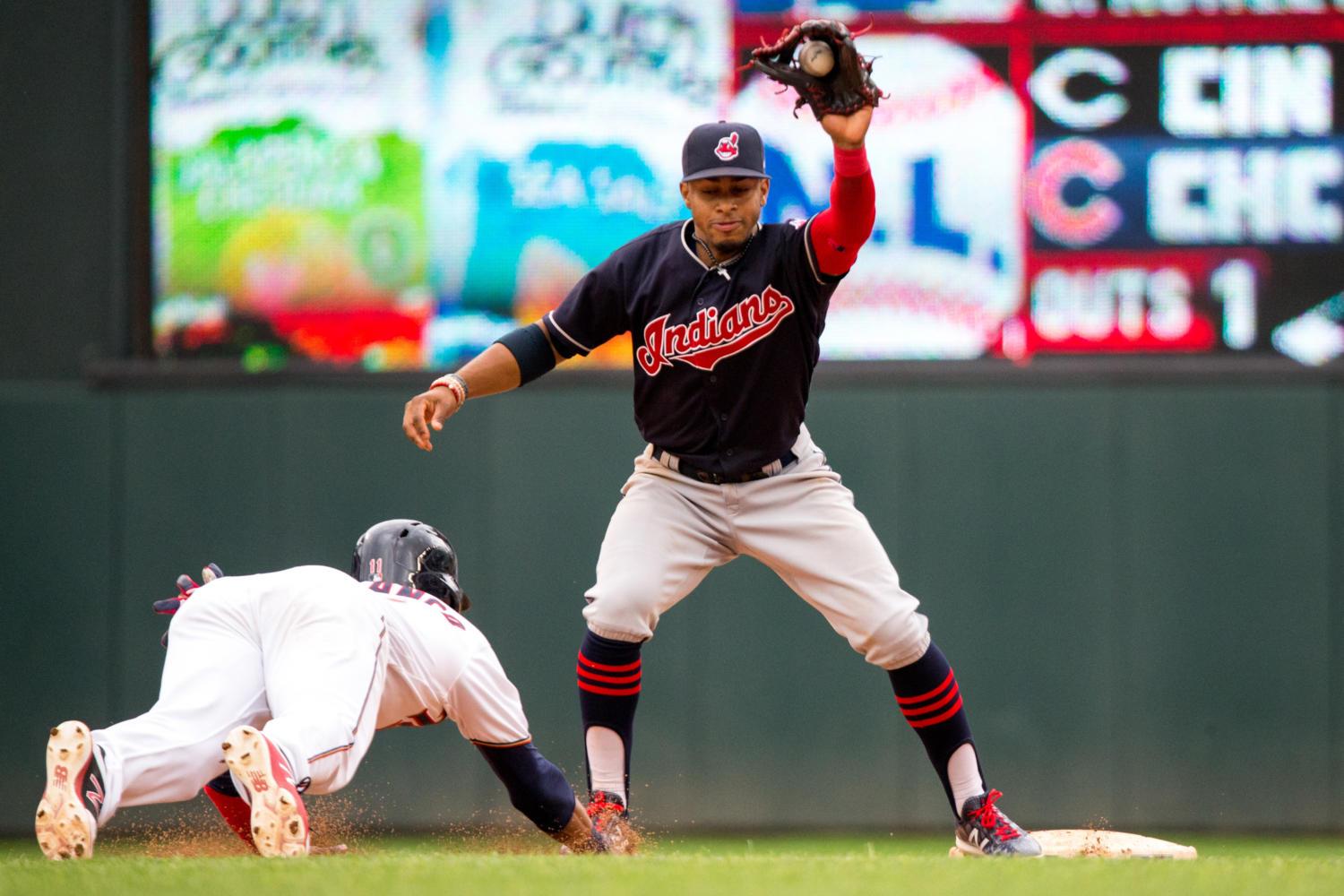 Cleveland Indians shortstop Francisco Lindor tags out the Minnesota Twins' Jorge Polanco, left, at second base during the first game of a doubleheader on Thursday, Aug. 17, 2017, at Target Field in Minneapolis. The Indians won, 9-3.