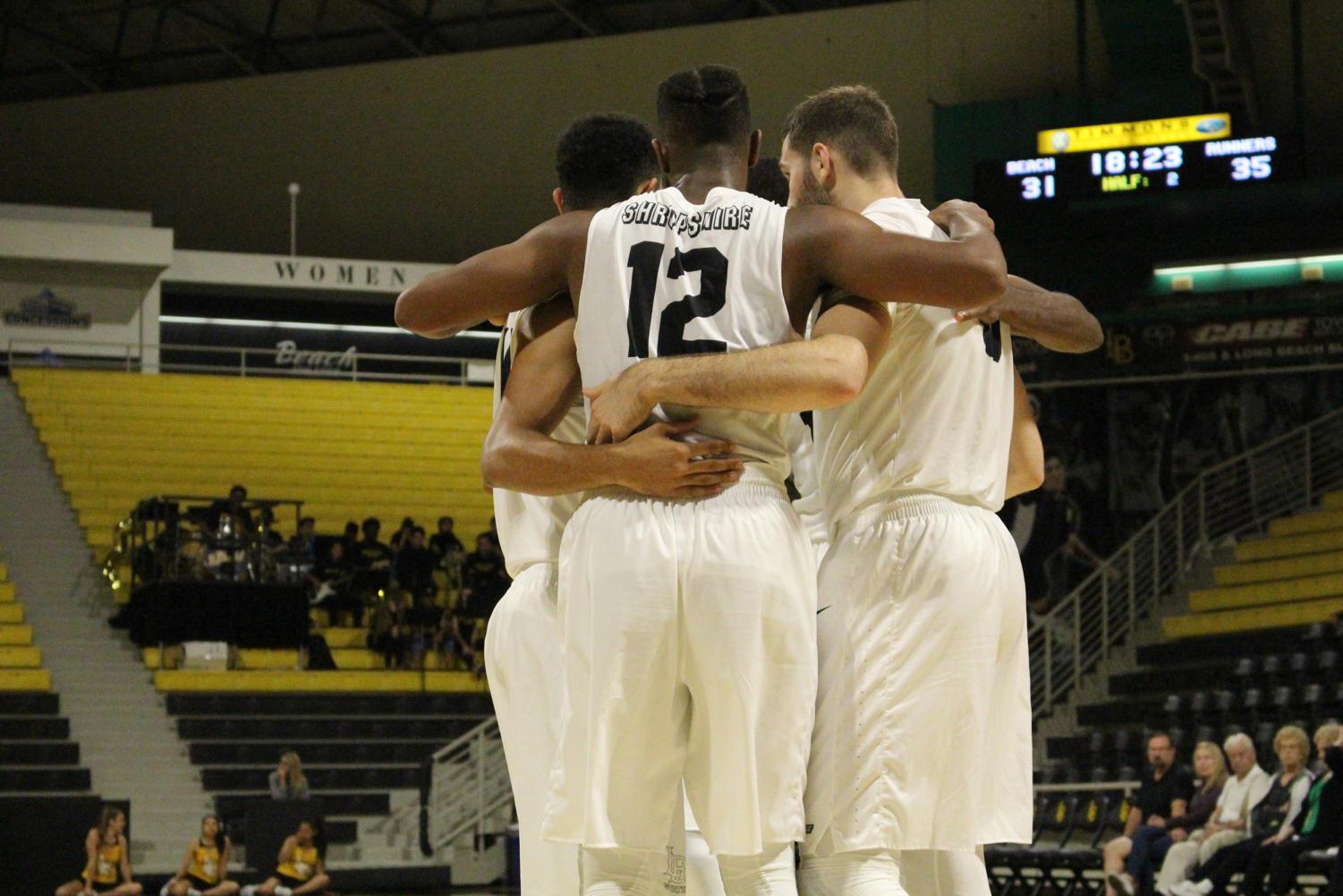 Long Beach State men's basketball huddles up in Monday's exhibition game against CSU Bakersfield at the Walter Pyramid.