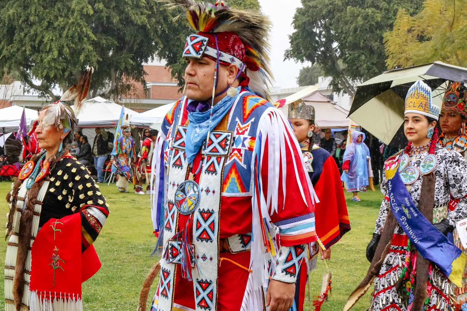 Representatives for various tribal backgrounds participate in a drum circle to celebrate their culture. The 48th Annual CSU Puvungna Pow Wow; Outreach event took place in the quad on Saturday and Sunday.