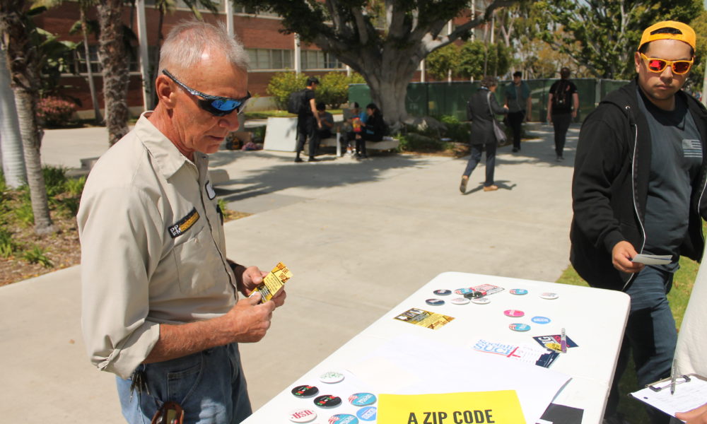 "Look at different countries in a socialist regime, they are struggling and starving," said Bob Provencher, a grounds keeper for LBSU. The Turning Point USA tabling took place at LBSU near LA 5 on March 26, 2019.