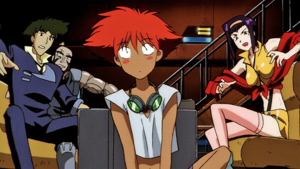The main characters of the anime show "Cowboy Bebop" sit looking surprised into the camera.