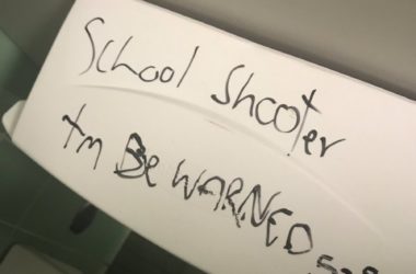 Graffiti in the women's restroom reading, "School shooter tm be warned 5-9."