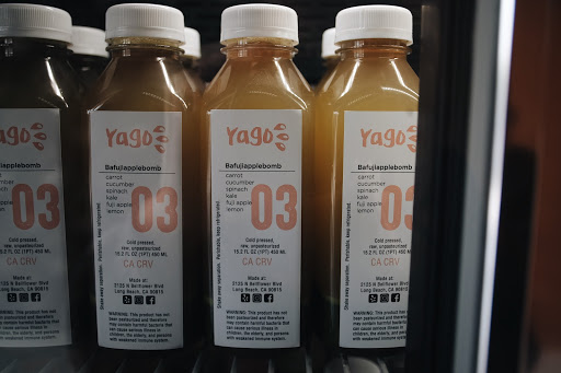 Bottles of cold pressed juice in the fridge