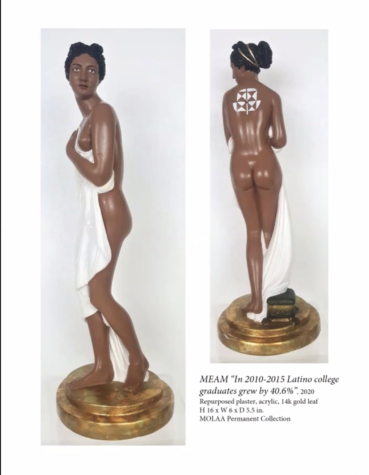 A figure of a Grecian goddess that artist Linda Vallejo painted over in brown and included a pictograph on her back representing a data set of the number of Latinx college graduates.