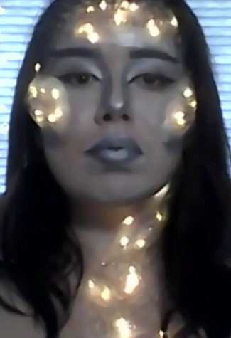 Devin Justice incorporated strings of fairy lights into her makeup design as part of the assignment to use nontraditional makeup items. Photo courtesy of Gayle Baizer.