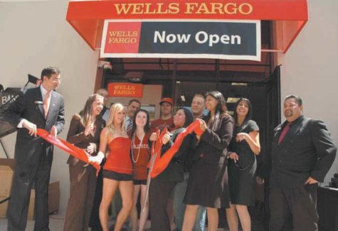 Tonya Hamrich, manager of Wells Fargo, cuts the ribbon of the new location at the South Plaza on Friday, Sept. 9, 2008. The bank offers full banking services, the first of its kind in the CSU system.