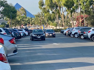 Cars circle around lot E11 at 5:15 p.m. Wednesday.
