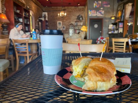 A sausage and cheddar croissant sandwich from The Library Coffee House.