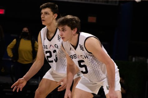 01/28/22 - Redshirt sophomore Aiden Knipe, right, set the ball 90 times against the Ohio State Buckeyes on Friday, Jan. 28 at Walter Pyramid. Almost half went to freshman outside hitter Alex Nikolov, left. Photo credit: Ignacio Cervantes.