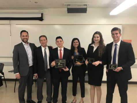 The first competition that Vaishalee Chaudhary and Marco Romero won (2019) L to R Kevin Poush (assistant coach), Dr. Lewis Ringel, Marco Romero, Vaishalee Chaudhary, Aleece Hanson, Barry Klein (class of 2021). Photo Credit: Aleece Hanson