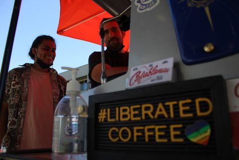 Juan Fernandez (left), and Cameron Kude (right), brewing up espresso drinks on the corner of Junipero and Ocean Blvd, in downtown Long Beach.