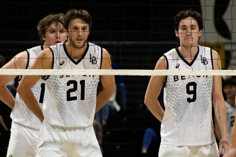 02/25/2022: Long Beach, CA- Long Beach State men's volleyball defeated Stanford University on Friday. Junior middle blocker Grant Maracchi (center) and sophomore outside hitters Nathan Harlan (right) and Clarke Godbold (background) prepare for a Cardinal serve.