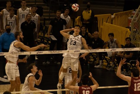 02/25/2022: Long Beach, CA- The ball is set for CSULB Outside Hitter Alex Nikolov to spike the ball against Stanford University in The Pyramid on Friday. Photograph by: Sonny Tapia