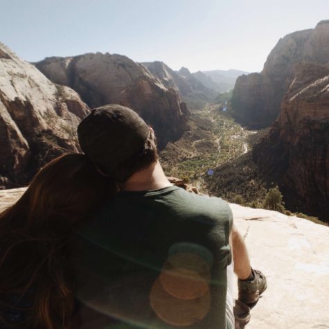 Hunter and his girlfriend Kinsley Rolph sit on top of Angels Landing at Zion National Park.