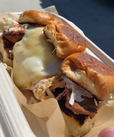 Add a fried egg to the Pork Belly Sliders at Something Good LA for an addition of flavor.