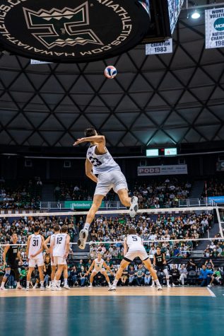 Alex Nikolov serving the ball against Hawai'i in the Big West tournament