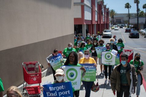 Environmental activist march to Target on Earth Day, to protest the company's contribution to climate change.