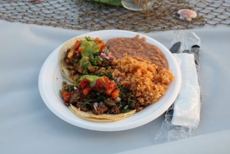 Taco meal served at celebration event.