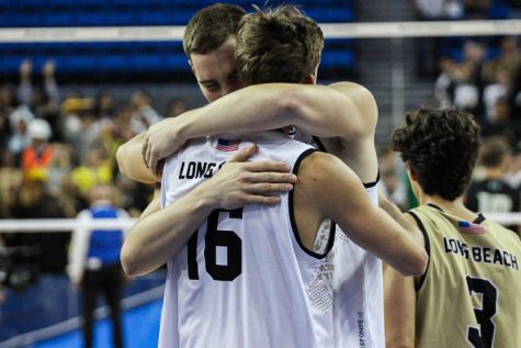Simon Torwie and Marc Moody have an emotional embrace after losing to Hawaii.