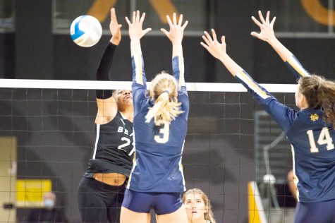 CSULB Women's volleyball team Outside Hitter, Victoria O'Sullivan (left), attempts a kill against Notre Dame's Avery Ross (middle) and Lauren Tarnoff (right) during CSULB's matchup against Notre Dame on Saturday, Sept. 3, 2022, inside the Walter Pyramid.