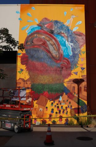 The brightly painted mural can be located at 245 E 3rd Street.