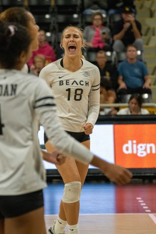 Katie Kennedy (#18) of the CSULB Women's volleyball team celebrates after a successful kill against the UCSB Gauchos in CalState Long Beach's Pyramid on Friday, Oct. 7, 2022. (PHOTO: Marc Federici)