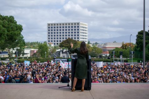 Rep. Alexandria Ocasio-Cortez encouraged the crowd at UC Irvine to vote in the upcoming midterm elections.
