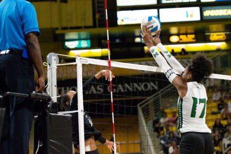 10/01/2022 - Long Beach, Calif: Long Beach State Women's volleyball player, Jaylen Jordan has her kill attempt contested by Hawai'i's Caylen Alexander, Jordan led the Beach with 14 kills in the loss to Hawai'i, with a final score of 3-1.