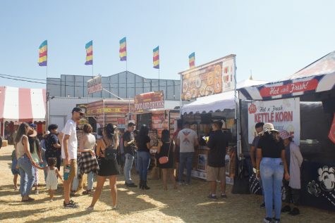 People line up for the various food tents that are available in between attractions.