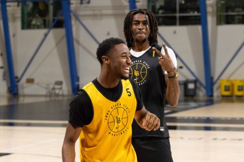 10/10/2022 - Long Beach, Calif: Long Beach State Men's Basketball player, Jason Hart Jr. (#5), sharing some laughs and banter with teammate, Amari Stroud (#1), during a Monday pratice inside the Walter Pyramid.