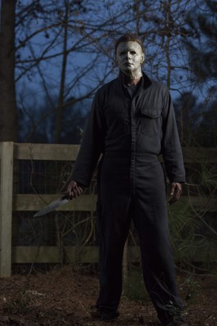 Michael Myers with his famous kitchen knife going through the streets of Haddonfield, Ill to kill as many people as he can while looking for Laurie Strode, a survivor of the 1978 Halloween movie.