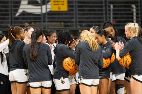 11/12/2022 - Long Beach, Calif: The Long Beach State women's basketball team huddle up before the tipoff of their regular season home opener against La Sierra inside the Walter Pyramid.