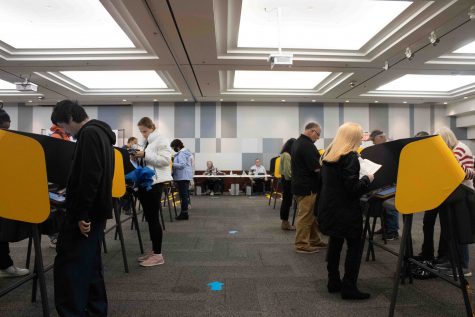 Students and faculty were able to vote privately on campus inside booths provided after receiving ballot information from check-in on campus at Cal State Long Beach.
