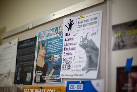 A flyer promoting the Student Illustration Production Society is shown next to other arts-related flyers in the hallways of FA-4.