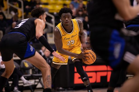 02/09/2023: Long Beach, CA- LBSU sophomore forward Aboubacar Traore looks to pass the ball during the team's 75-72 loss at home in the Walter Pyramid against UCSB.
