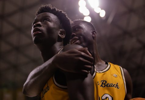 02/09/2023: Long Beach, CA- LBSU sophomore forward Aboubacar Traore glares at the scoreboard as time is winding down during the loss to UCSB with his teammate sophomore forward Lassina Traore at home Thursday night.