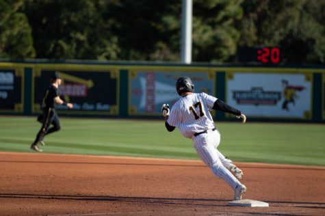 02/19/2023 - Long Beach, Calif: LBSU sophomore catcher, Cole Santander, runs past first base during the bottom of the fifth inning against Wichita State at Blair Field.