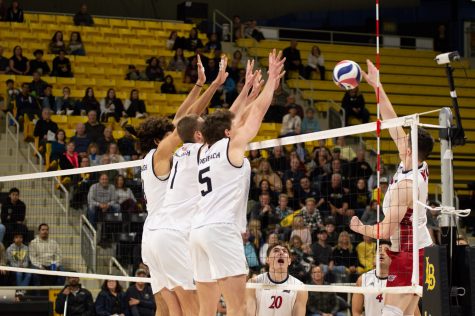02/18/2023 - Long Beach, Calif: The LBSU men's volleyball team go for a triple block against NJIT inside the Walter Pyramid. The Beach finished with 13 total blocks in the game.