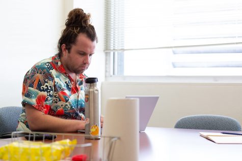 Philosophy graduate student, Joe Gordon, uses his laptop. "From a student&squot;s perspective, I don&squot;t really see a difference [between Canvas and Beachboard]. From an administrative perspective, I&squot;ve heard about some issues with Canvas," he said.