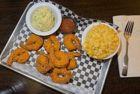 2/1/2023 Shoreline Village, Long Beach- Crispy, Fried Jumbo Bayou Shrimp accompanied by creamy and cheesy southern-style mac and cheese. You can get the shrimp blackened or fried.