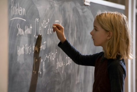 Mckenna Grace portrays math prodigy Mary Adler as she tries to solve a college-level equation on the board.