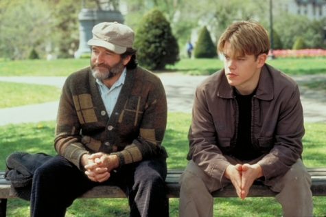 Robin Williams plays therapist Sean Maguire sitting next to Will Hunting, a college janitor who is a math genius played by Matt Damon.