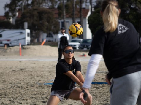 03/23/2023 - Long Beach, Calif: Malia Gementera tries to track the volleyball for a bump so the ball can stay in play.