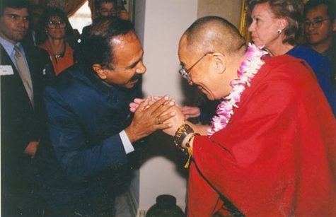 Professor Sasi with H.H. the Dalai Lama at a Peace Conference.