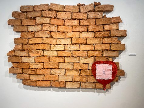 Adobe brick project, titled "Laying the foundation down for love" made to represent the importance of community.