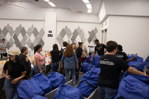 Once the Guardian Scholars received their care duffels and swag bags, they prepared for the journey from the College of Business to their dorm rooms.