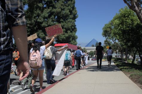 08/30/2023 - Long Beach, Calif: Cal State Long Beach protest the tuition increase by marching around campus with signs, chants, and calls for action.