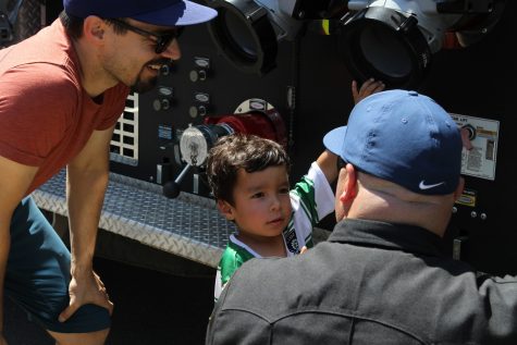 Julien Raspa, 3, explores a fire engine at the emergency expo event on Saturday, Sept. 9, 2023.