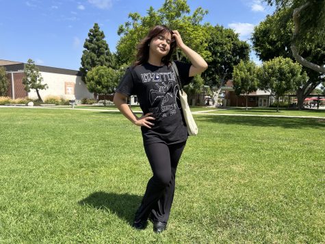 First-year theater arts student Jeanneatte Mendoza sports an all-black outfit with a Led Zeppelin t-shirt, ribbed flair leggings and loafers.